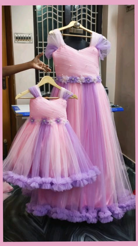 mother and daughter same gown real image